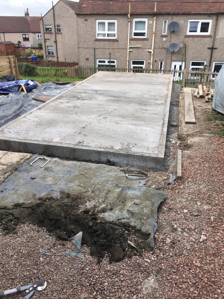 Professional grass cutting with striped lawn finish